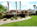 Brick home with manicured lawn and walkway at 1947 Quintilis Ct, Deltona, FL 32738