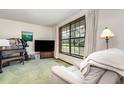 Inviting living room with a large window providing ample natural light and a cozy atmosphere at 2351 Mandarin Rd, Deland, FL 32720