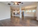 Spacious living room with hardwood floors and open floor plan at 530 Windy Pine Way, Oviedo, FL 32765