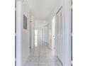 Bright hallway with tile floors and multiple closets at 810 Christian Way, Kissimmee, FL 34741