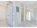 Clean and bright hallway with tile floors and access to rooms at 810 Christian Way, Kissimmee, FL 34741