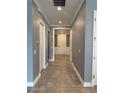 Bright entryway with tile flooring and neutral-colored walls at 984 Maypole Dr, Apopka, FL 32703