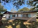 Attractive ranch style home with a well-manicured lawn at 1018 4Th St, Port Orange, FL 32129