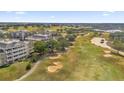 Aerial view of condos near a golf course at 1358 Centre Court Ridge Dr # 202, Reunion, FL 34747