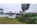 Side view of house showing additional yard space at 167 Benjamin Dr, Ormond Beach, FL 32176