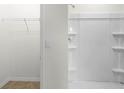 Bathroom with shower and closet at 2623 Sage Valley Way, Winter Haven, FL 33884