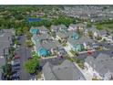 Aerial image of a neighborhood with colorful houses at 3013 Bonfire Beach Dr # 101, Kissimmee, FL 34746