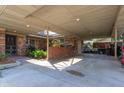 Covered carport with brick accents and lush landscaping at 4135 Chuluota Rd, Orlando, FL 32820
