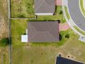 Top-down view of a single story house with a backyard at 1231 Citrus Landings Blvd, Davenport, FL 33837