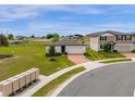 One-story house on a corner lot with a large yard at 1231 Citrus Landings Blvd, Davenport, FL 33837
