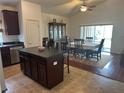Open kitchen and dining area with a large island, perfect for entertaining guests at 290 Clydesdale Cir, Sanford, FL 32773