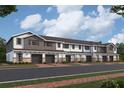 New townhome development; two-story homes with gray and white siding and brick accents at 5110 Rain Shadow Dr, St Cloud, FL 34772