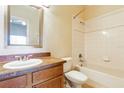 Clean bathroom with tub, toilet, and vanity at 114 Watling Way # 114, Davenport, FL 33897