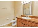 Bathroom with shower, toilet and vanity at 114 Watling Way # 114, Davenport, FL 33897