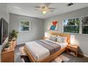 Spacious bedroom with a large bed and plenty of light at 1361 Peters Dr, Leesburg, FL 34748