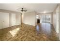 Open concept living area with tile floors and ceiling fan at 1490 Lake Opal Dr, Apopka, FL 32703