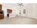 Bright, open kitchen with stainless steel appliances and tile flooring at 5400 Emerald Bay Ln, Lady Lake, FL 32159