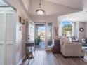 Bright and airy entryway with a view into the living area and backyard at 349 New Waterford Pl, Longwood, FL 32779