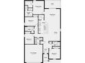Four-bedroom, two-bathroom home with open concept living area at 4765 Cloister St, Kissimmee, FL 34758