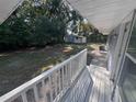 Large backyard with shed and wooden deck at 520 N Orange, Orange City, FL 32763
