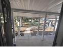 Covered porch with view of walkway and neighborhood at 520 N Orange, Orange City, FL 32763
