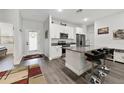 Modern kitchen featuring granite countertops and stainless steel appliances at 1630 W New York Ave, Orange City, FL 32763