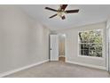 Bright bedroom with tile flooring and ceiling fan at 1964 Lake Atriums Cir # 175, Orlando, FL 32839