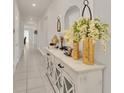 Bright and spacious foyer with a console table and decorative accents at 283 Archer Way, Haines City, FL 33844