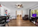 Spacious living area with hardwood floors and lots of natural light at 134 W Sunset St, Groveland, FL 34736