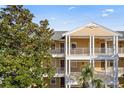 Condo building showcasing architectural details and a welcoming entrance at 114 Rum Run, Davenport, FL 33837