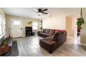Bright living room with large windows and comfortable sectional sofa at 1232 Saint James Rd, Orlando, FL 32808