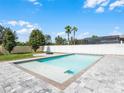 Relaxing rectangular pool with a spacious patio at 15233 Night Heron Dr, Winter Garden, FL 34787