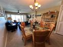 Open concept dining area with view into living room at 3501 S Atlantic Ave # 6060, New Smyrna Beach, FL 32169