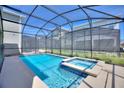Enclosed pool and spa area with plenty of sunshine at 4285 Prologue Way, Kissimmee, FL 34746