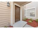 A front door view shows a well-lit entrance with maintained landscaping and a small porch at 686 Roaring Dr # 343, Altamonte Springs, FL 32714