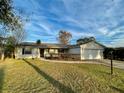 Charming single story home with a two car garage at 115 Cardamon Dr, Orlando, FL 32825