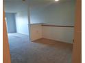Bright and airy living room with neutral carpet and freshly painted walls, ready for your personal touch at 1928 Conway Rd # 27, Orlando, FL 32812