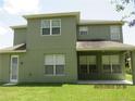 Covered patio with multiple windows and sliding glass doors at 3260 Sorrel Ct, Deltona, FL 32725