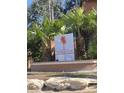 The Palms Club community entrance sign at 5548 Metrowest Blvd # 101, Orlando, FL 32811