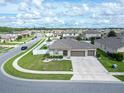 House with two-car garage and a spacious yard at 5681 Western Sun Dr, St Cloud, FL 34771