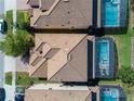 Bird's-eye view showing house and private pool in a residential area at 9024 Shadow Mountain St, Davenport, FL 33896