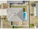 Bird's eye view of a house with pool and backyard oasis at 15267 Aquarius Way, Mascotte, FL 34753