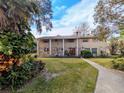 Ranch style home with stone accents and mature landscaping at 9430 Kilgore Rd, Orlando, FL 32836