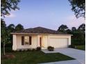 One story house with front yard and driveway at 1655 Andover Ridge Dr, Deland, FL 32720