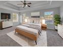 Spacious primary bedroom with large windows and ample natural light at 3124 Oak Brook Ln, Eustis, FL 32736