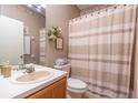 Clean bathroom with a shower/tub combo and updated vanity at 5999 Lake Pointe # 609, Orlando, FL 32822