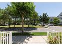 Residential street with lush green landscaping and homes at 4006 Markham Pl, Orlando, FL 32814