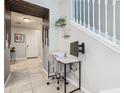Small home office with a desk, chair and printer at 3798 Lana Ave, Davenport, FL 33897