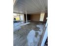 Covered carport area adjacent to the house at 423 Longfellow Blvd, Lakeland, FL 33801