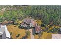 Luxury home on a large lot with a pool and lush landscaping at 506 Yellow Submarine Ct, Groveland, FL 34737